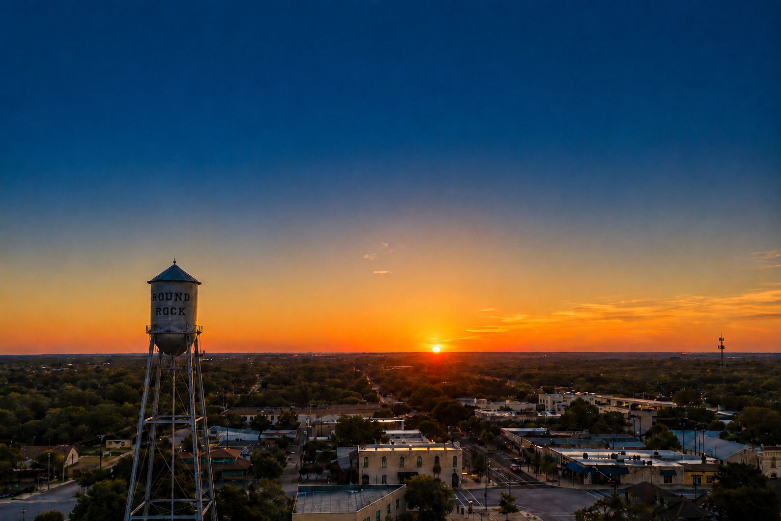 Round Rock TX water tower at sunset representing Central Texas business visibility and local SEO growth for small businesses