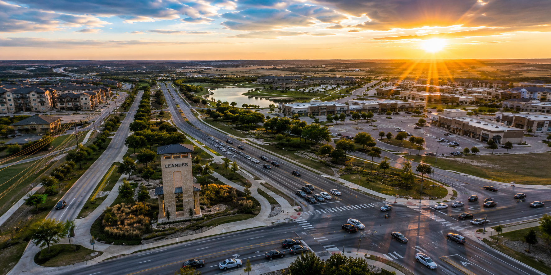 Aerial view of Leander Texas during golden hour showing local businesses, growing commercial development, active traffic, and increasing online visibility opportunities for small businesses.