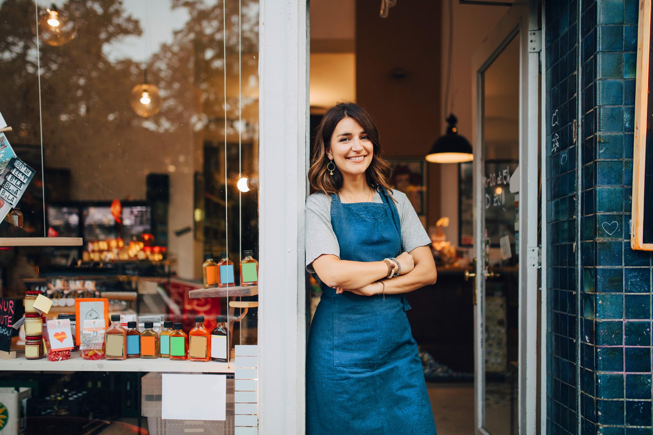 Central Texas small business owner standing outside a local storefront